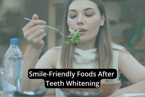 A woman enjoys a salad with a fork at a table, alongside a water bottle, with the text "Smile-Friendly Foods After Teeth Whitening"—perfect inspiration for your post-whitening diet.